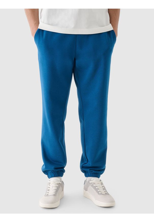 4f - 4F Spodnie dresowe joggery męskie - turkusowe L. Kolor: turkusowy. Materiał: dresówka. Wzór: gładki, ze splotem