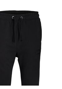 Jack & Jones Spodnie dresowe Kane Bleecker 12287165 Czarny Relaxed Fit. Kolor: czarny. Materiał: syntetyk #7