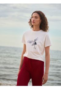Reserved - T-shirt z nadrukiem - złamana biel. Materiał: bawełna, dzianina. Wzór: nadruk