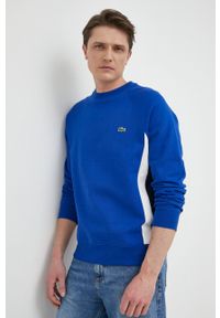 Lacoste bluza męska kolor niebieski wzorzysta. Kolor: niebieski. Materiał: dzianina. Długość rękawa: raglanowy rękaw. Wzór: aplikacja #1