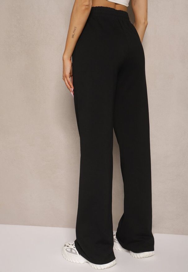 Renee - Czarne Spodnie Szerokie Pallenassa. Stan: podwyższony. Kolor: czarny. Materiał: dzianina. Długość: długie