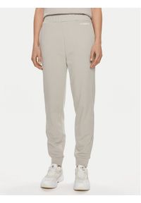 Calvin Klein Spodnie dresowe Micro Logo K20K206632 Beżowy Regular Fit. Kolor: beżowy. Materiał: bawełna
