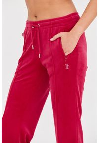 Juicy Couture - JUICY COUTURE Różowe damskie spodnie dresowe Tina Track Pants, Rozmiar XS. Kolor: różowy. Materiał: dresówka