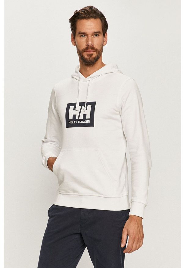 Helly Hansen Bluza bawełniana kolor biały z kapturem z nadrukiem. Okazja: na co dzień. Typ kołnierza: kaptur. Kolor: biały. Materiał: bawełna. Wzór: nadruk. Styl: casual