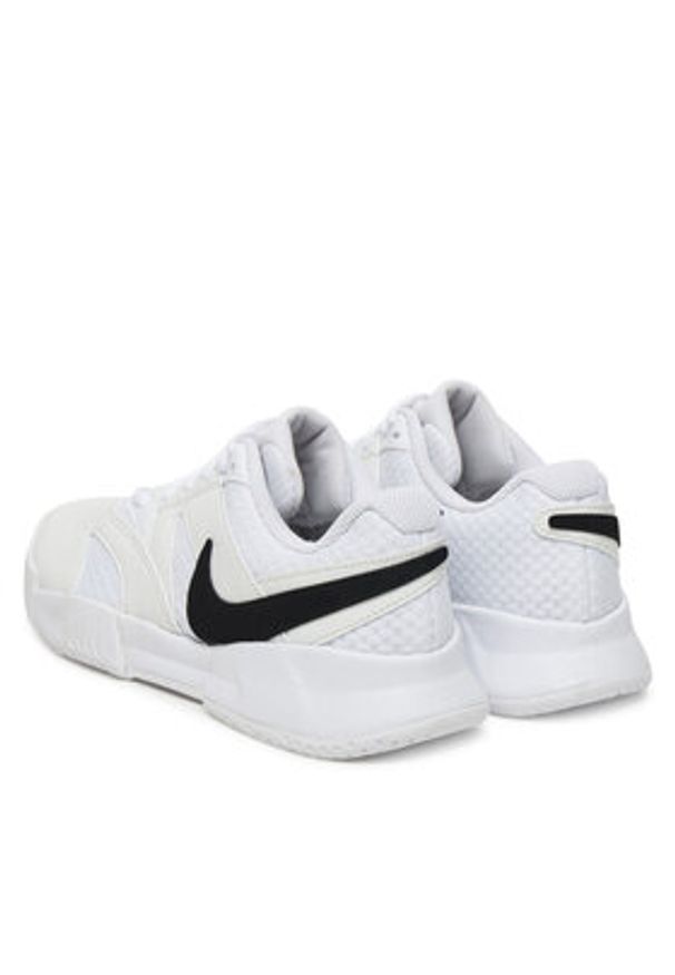 Nike Buty do tenisa W Court Lite 4 FD6575 100 Biały. Kolor: biały. Materiał: skóra. Model: Nike Court. Sport: tenis
