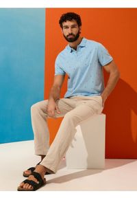 Sinsay - Bawełniana koszulka polo - błękitny. Typ kołnierza: polo. Kolor: niebieski. Materiał: bawełna #1