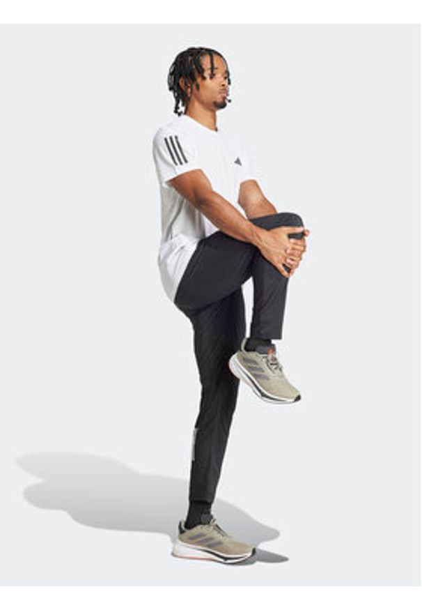 Adidas - adidas Koszulka techniczna Own the Run IK7436 Biały Regular Fit. Kolor: biały. Materiał: syntetyk. Sport: bieganie