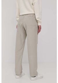 Rains spodnie 18700 Woven Pants Regular kolor zielony proste high waist. Stan: podwyższony. Kolor: zielony. Materiał: tkanina
