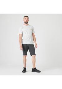 DOMYOS - Koszulka z krótkim rękawem do parkouru męska. Oddychająca, lejąca, wytrzymała.. Kolor: szary. Materiał: materiał, lyocell, poliester, elastan. Długość rękawa: krótki rękaw. Długość: krótkie. Wzór: ze splotem