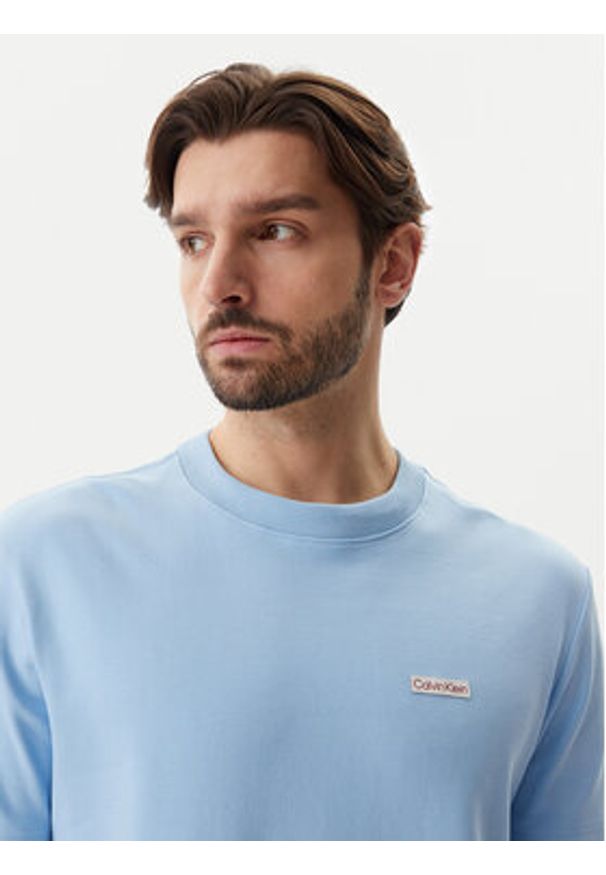 Calvin Klein Jeans T-Shirt J30J327234 Błękitny Regular Fit. Kolor: niebieski. Materiał: bawełna