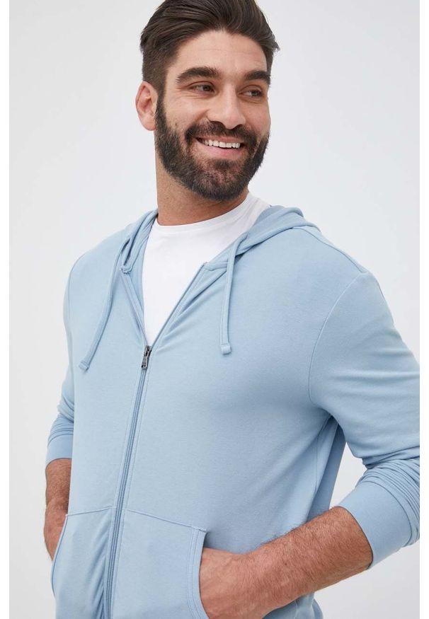 Polo Ralph Lauren bluza męska z kapturem gładka. Okazja: na co dzień. Typ kołnierza: polo, kaptur. Kolor: niebieski. Materiał: dzianina. Wzór: gładki. Styl: casual