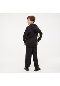 Dres dziecięcy Puma. Okazja: na uczelnię. Kolor: czarny, wielokolorowy, żółty. Materiał: dresówka. Styl: sportowy