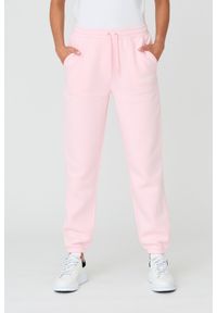 Juicy Couture - JUICY COUTURE Różowe damskie spodnie Sora, Rozmiar M. Kolor: różowy. Materiał: guma, bawełna