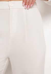 Born2be - Jasnobeżowe Eleganckie Szerokie Spodnie z Gumką w Pasie Zapinane na Suwak Barcarola. Okazja: na co dzień. Kolor: beżowy. Materiał: jedwab. Styl: elegancki #6