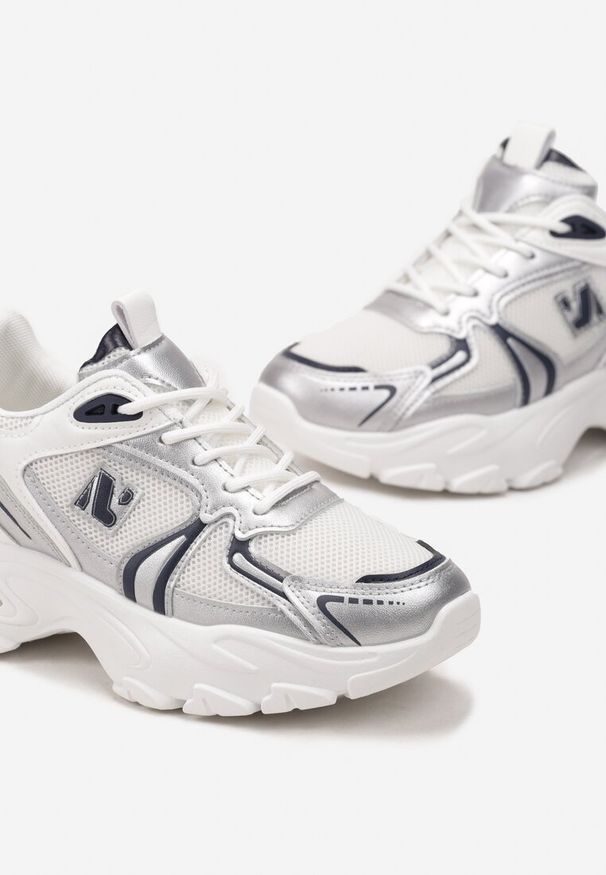 Renee - Białe Sznurowane Sneakersy z Siateczką i Wycięciami Solenare. Kolor: biały