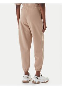 Guess Spodnie dresowe V6GB02 K2915 Beżowy Regular Fit. Kolor: beżowy. Materiał: syntetyk #3