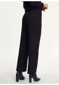 Ochnik - Czarne błyszczące spodnie damskie. Kolor: czarny. Materiał: wiskoza #3