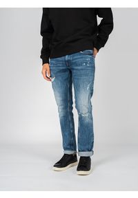 TOMMY HILFIGER - Tommy Jeans Jeansy "Scanton" | DM0DM13202 | Scanton | Mężczyzna | Niebieski. Kolor: niebieski. Wzór: aplikacja