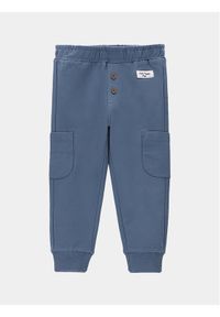 COCCODRILLO - Coccodrillo Spodnie dresowe WC4120102DEN Niebieski Regular Fit. Kolor: niebieski. Materiał: bawełna #1