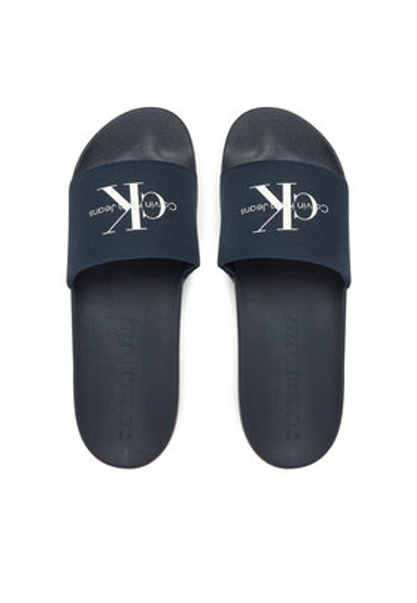 Calvin Klein Jeans Klapki Slide Monogram Cv YM0YM01271 Granatowy. Kolor: niebieski. Materiał: materiał