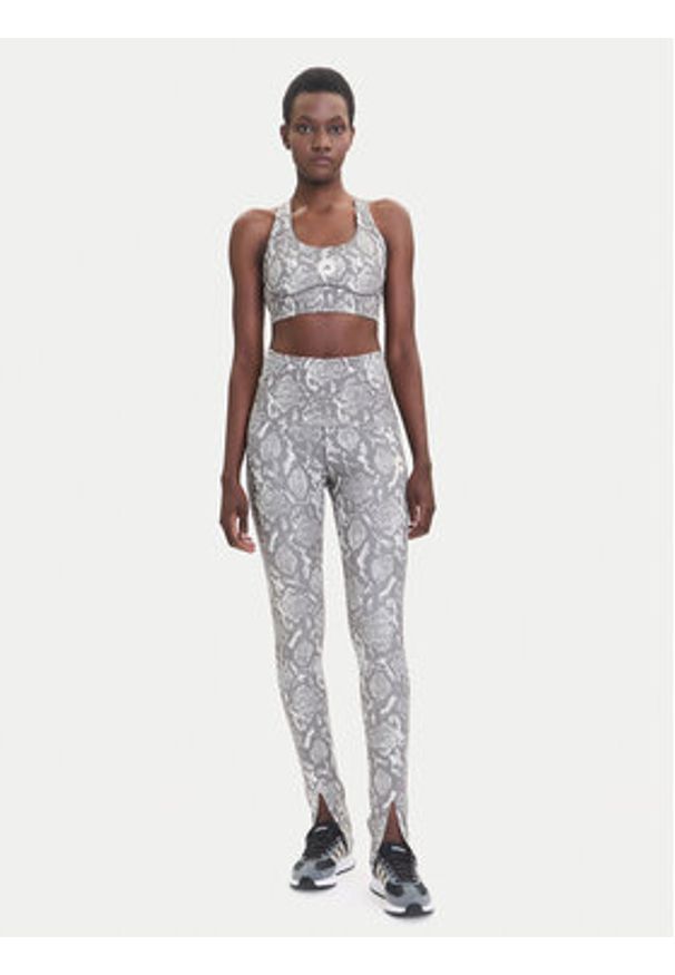 Adidas by Stella McCartney - adidas by Stella McCartney Biustonosz sportowy Power Impact JM6092 Beżowy Slim Fit. Kolor: beżowy. Materiał: syntetyk