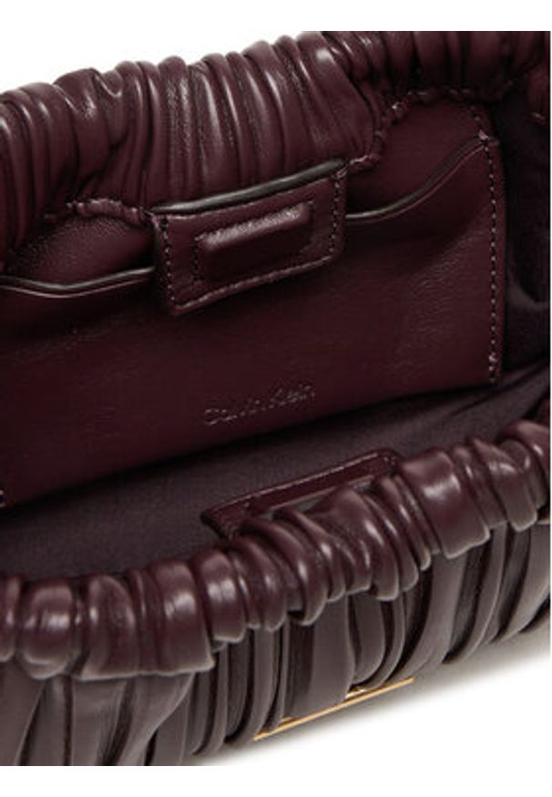 Calvin Klein Torebka Plisse Mini Drawstring Bag LV04F3077G Bordowy. Kolor: czerwony. Materiał: skórzane