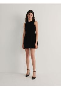 Reserved - Sukienka mini - czarny. Kolor: czarny. Materiał: dzianina. Wzór: gładki. Typ sukienki: proste. Długość: mini #1