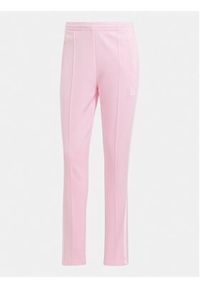 Adidas - adidas Spodnie dresowe adicolor SST IR8076 Różowy Slim Fit. Kolor: różowy. Materiał: bawełna #2