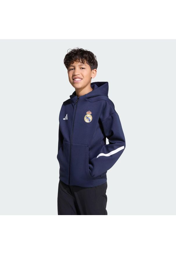 Adidas - Bluza Real Madrid ADIDAS Z.N.E. Anthem Kids. Typ kołnierza: kaptur. Kolor: niebieski. Sport: piłka nożna