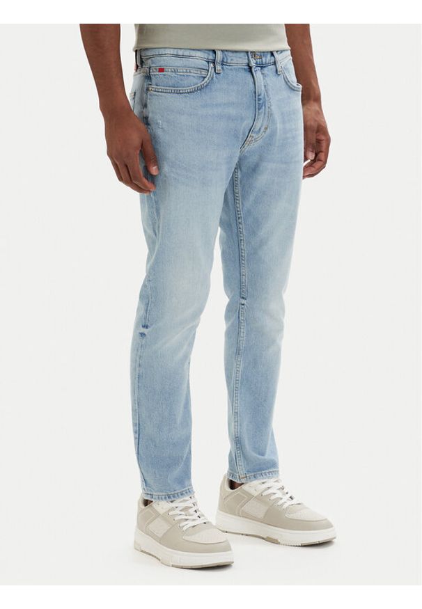 Hugo - HUGO Jeansy 50556047 Niebieski jasny Extra Slim Fit. Kolor: niebieski