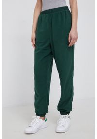 GAP Spodnie dwustronne damskie kolor zielony joggery medium waist. Kolor: zielony. Materiał: materiał #2