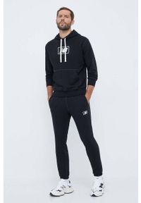 New Balance spodnie dresowe kolor czarny gładkie. Kolor: czarny. Materiał: dresówka. Wzór: gładki #3