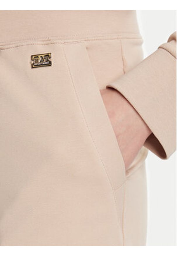 EA7 Emporio Armani Spodnie dresowe 7W000461 AF13135 U1046 Beżowy Regular Fit. Kolor: beżowy. Materiał: bawełna