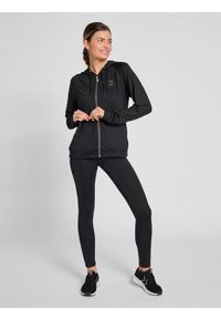 Damskie pełne legginsy Hummel q4 Hw. Kolor: czarny. Materiał: materiał. Wzór: jodełka, nadruk. Sport: fitness