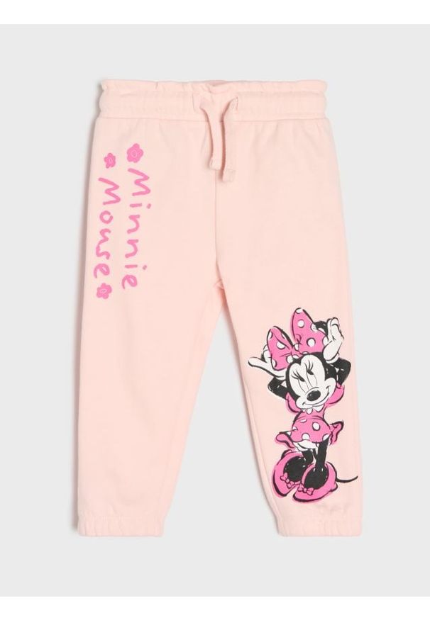 Sinsay - Spodnie dresowe jogger z nadrukiem Minnie Mouse - różowy. Kolor: różowy. Materiał: dresówka. Wzór: nadruk, motyw z bajki