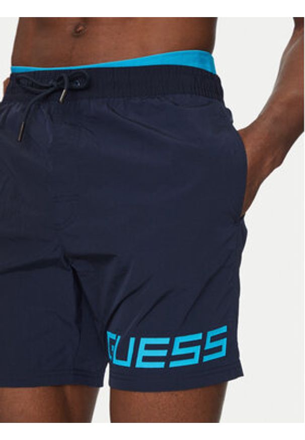 Guess Szorty kąpielowe F5GT12 WH1C2 Granatowy Regular Fit. Kolor: niebieski. Materiał: syntetyk