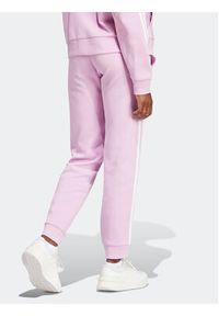 Adidas - adidas Spodnie dresowe Future Icons 3-Stripes IM2546 Różowy Regular Fit. Kolor: różowy. Materiał: bawełna