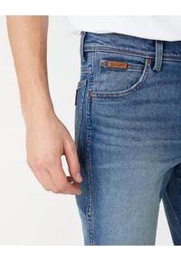 Wrangler - WRANGLER TEXAS TAPER MĘSKIE SPODNIE JEANSOWE BLUE CHILL W12TU898T