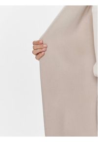 Calvin Klein Płaszcz wełniany K20K206746 Beżowy Relaxed Fit. Kolor: beżowy. Materiał: wełna