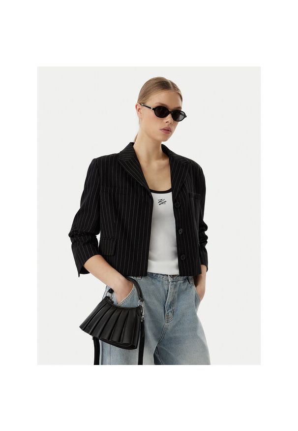 Torebka Lacoste. Kolor: czarny