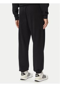 Adidas - adidas Spodnie dresowe Seasonal Essentials Collegiate French Terry Cuffed KF4264 Czarny Regular Fit. Kolor: czarny. Materiał: bawełna #4