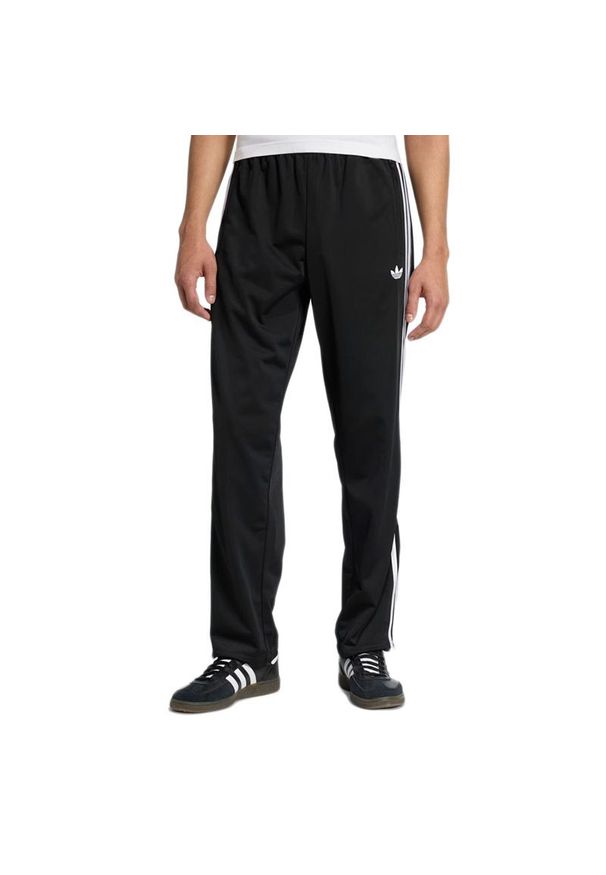 Adidas - Spodnie męskie adidas Originals Firebird KD8315 - czarna. Kolor: czarny. Materiał: dresówka, poliester. Wzór: paski