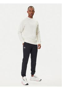 Under Armour Spodnie dresowe UA Vibe Woven 1386557 Czarny Regular Fit. Kolor: czarny. Materiał: syntetyk #4