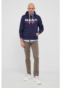 GANT - Gant Bluza męska kolor granatowy z kapturem z nadrukiem. Okazja: na co dzień. Typ kołnierza: kaptur. Kolor: niebieski. Materiał: dzianina. Wzór: nadruk. Styl: casual