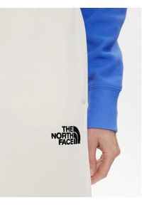 The North Face Spodnie dresowe Essential NF0A7ZJF Écru Relaxed Fit. Materiał: bawełna, syntetyk