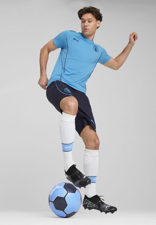 Puma - Męska koszulka Casuals Manchester City PUMA Magic Blue New Navy. Kolor: niebieski