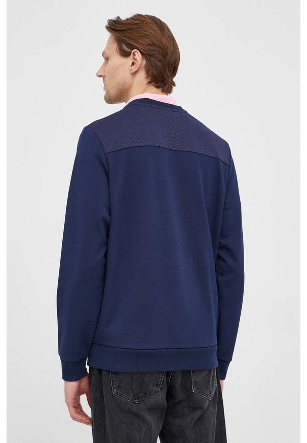 Lacoste bluza męska kolor granatowy gładka. Okazja: na co dzień. Kolor: niebieski. Materiał: dzianina. Wzór: gładki. Styl: casual