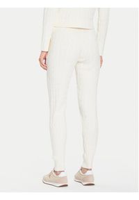 Guess Spodnie dzianinowe V5BB20 Z0572 Beżowy Regular Fit. Kolor: beżowy. Materiał: syntetyk