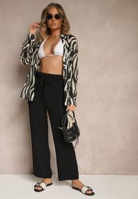 Renee - Czarne Spodnie z Szeroką Nogawką Wiązane w Talii Salemira. Okazja: na co dzień. Kolor: czarny. Styl: casual #4