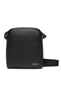 Calvin Klein Jeans Saszetka Mono Logo Reporter 18 LV04G3014G Czarny. Kolor: czarny. Materiał: skóra